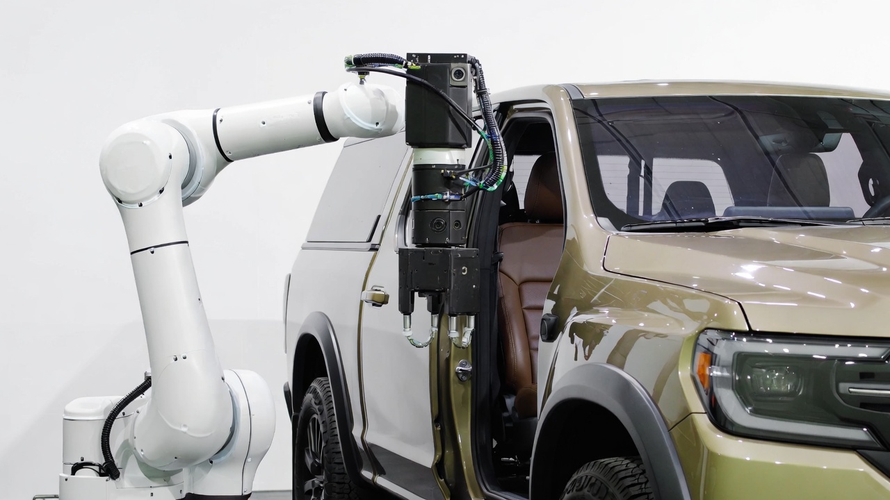 Robot at open vehicle door