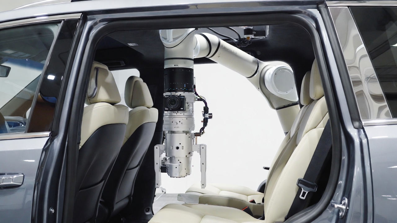 Robot camera inside vehicle